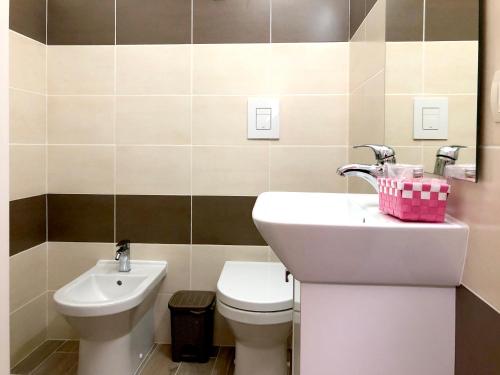 Salle de bains dans l'établissement Maison Ortigia