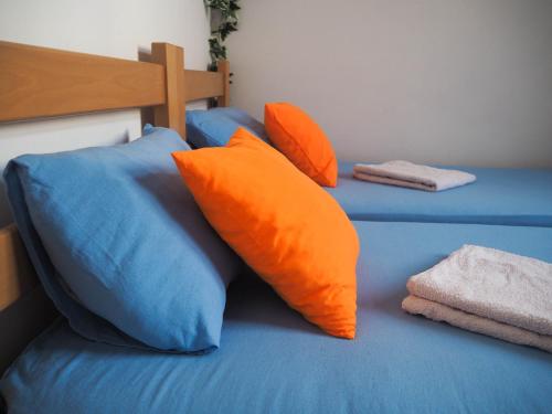 En eller flere senge i et værelse på Hostel El Diablo