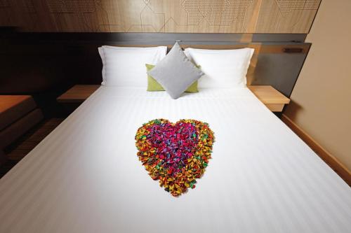 Postel nebo postele na pokoji v ubytování ibis Styles Makkah