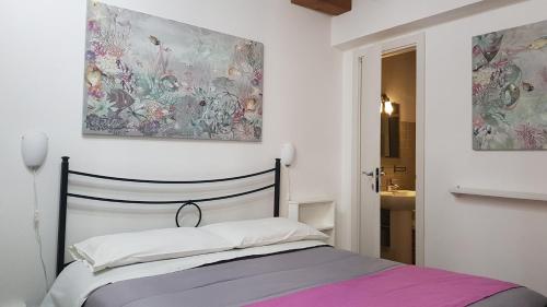 Postel nebo postele na pokoji v ubytování PalermiT'Amo