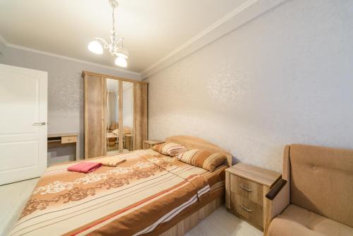 Квартира по улице Цитадельная, 9 tesisinde bir odada yatak veya yataklar