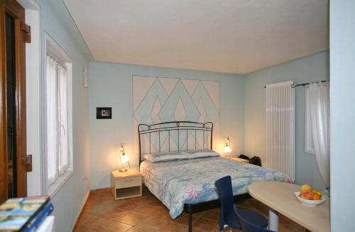 Postel nebo postele na pokoji v ubytování B&B 21