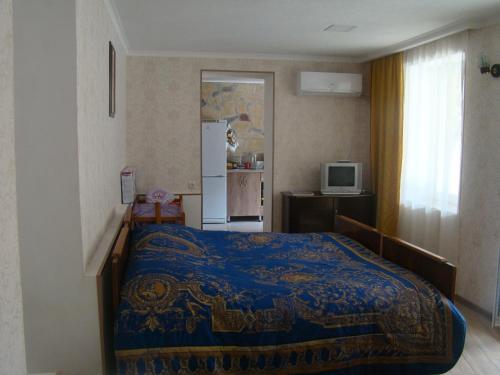 Postel nebo postele na pokoji v ubytování Guest House Ucha