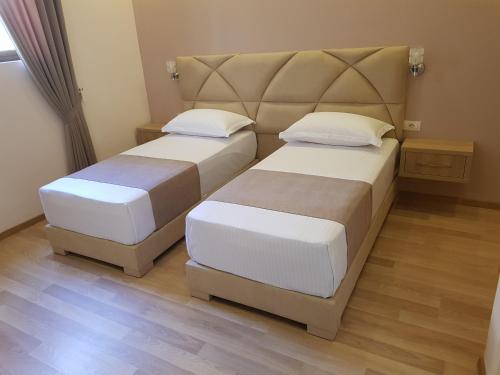 Villa Arben Eleziにあるベッド