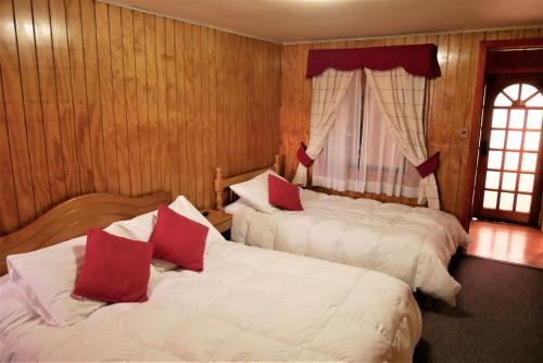 Cama o camas de una habitación en Hospedaje Maria