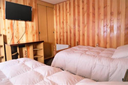 Cama o camas de una habitación en Hospedaje Maria