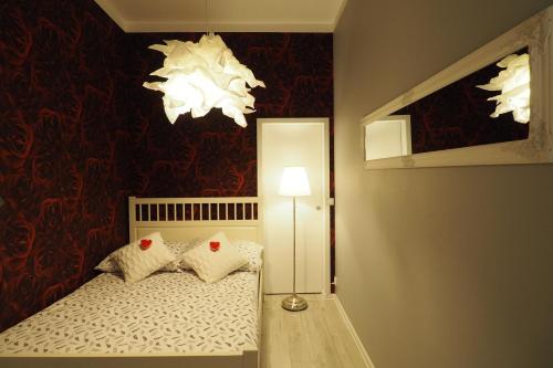 Ένα ή περισσότερα κρεβάτια σε δωμάτιο στο KGHN Apartments Tkacka