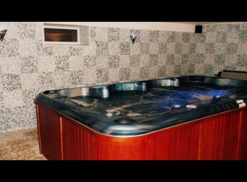 a kitchen counter with a stove top in a kitchen at Marijonu Apartments in Panevėžys