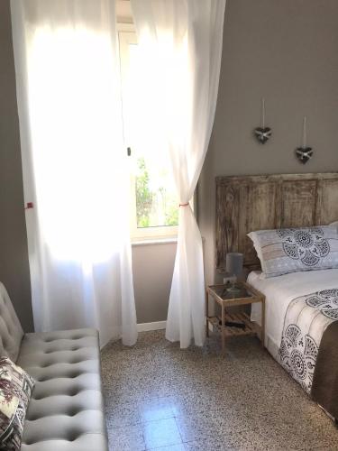 Il Giardino Di Vico Neveにあるベッド