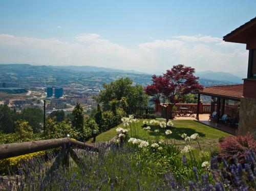 a view from the garden of a house at Hotel Casa Camila in Oviedo