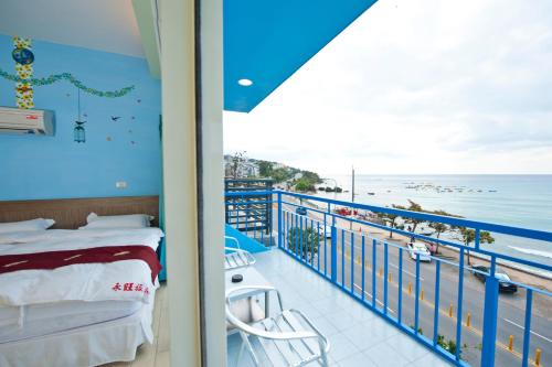 A bed or beds in a room at 永旺旅店 Yong Wong Hostel