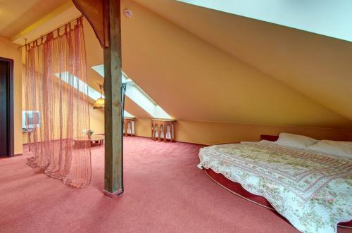 Cama o camas de una habitación en Aerohotel