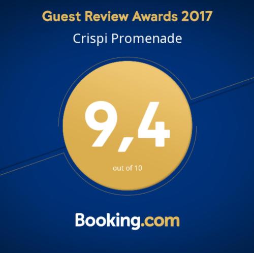 a yellow circle with the text guest review awards crtpri programme at Crispi Promenade in Cava deʼ Tirreni