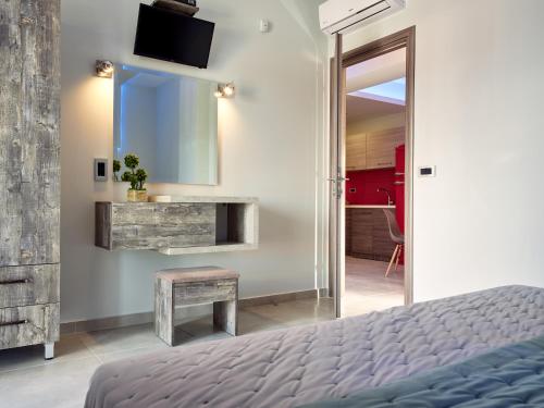 Katil atau katil-katil dalam bilik di Savvas Luxury Suites
