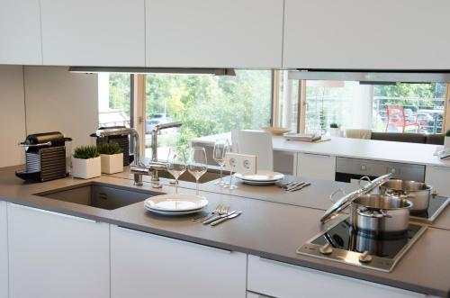 Dapur atau dapur kecil di Lumina Apartments