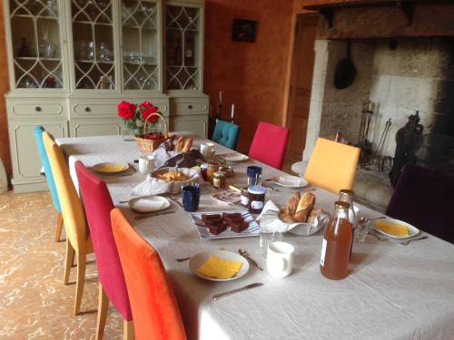a table with food on it in a room at Villa Marambat in Marambat