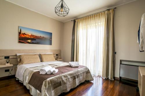 Letto o letti in una camera di A casa di Alberto