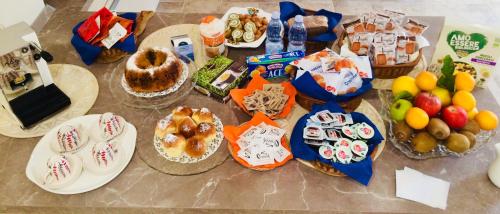 a table with many different types of food on it at B&B San Paolo in Campagna