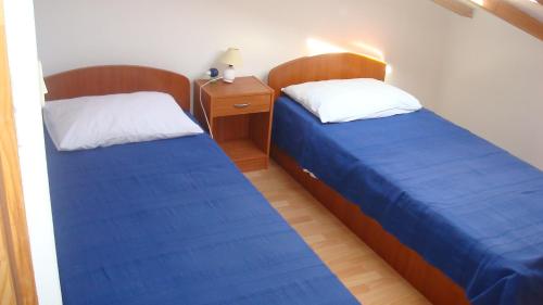 Postelja oz. postelje v sobi nastanitve Guesthouse Villa Ljubica