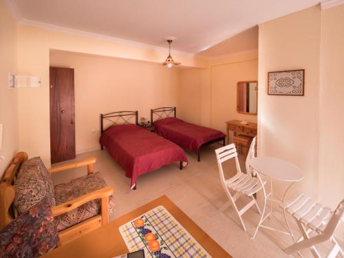 Katil atau katil-katil dalam bilik di Antigoni House