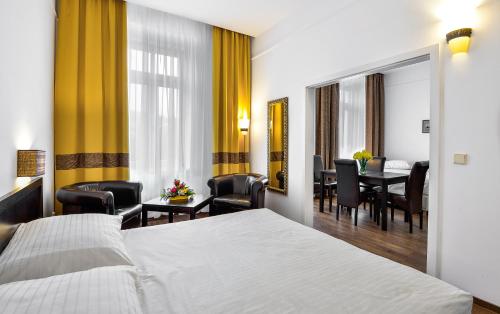 Posteľ alebo postele v izbe v ubytovaní Apartments Central Park Marienbad