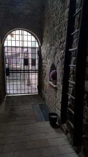 a room with an open door to a brick oven at La Torretta - Cerreto Grue in Sarezzano