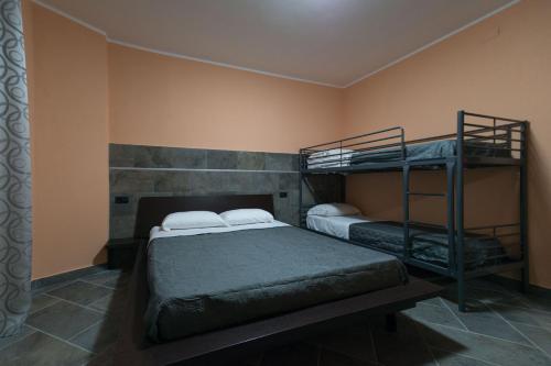 Postel nebo postele na pokoji v ubytování B&B Mazzini