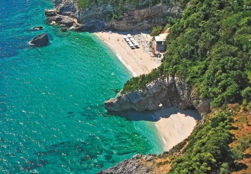 an aerial view of a beach and the ocean at Vergonis Studios in Koropi