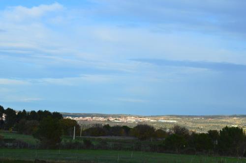 a view of a city from a field at Posada La Reja in Malpica