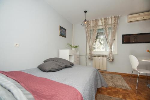 Кровать или кровати в номере Marko Zagreb