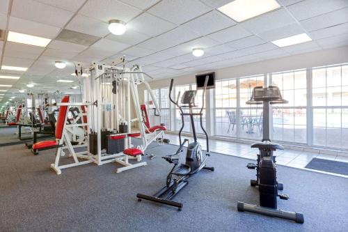 a gym with treadmills and machines in a building at Extend-a-Suites - Extended Stay, I-40 Amarillo West in Amarillo
