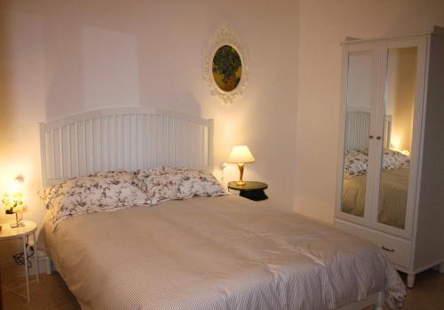 מיטה או מיטות בחדר ב-Casa Sofì