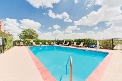 The swimming pool at or close to Baymont by Wyndham Midland Airport