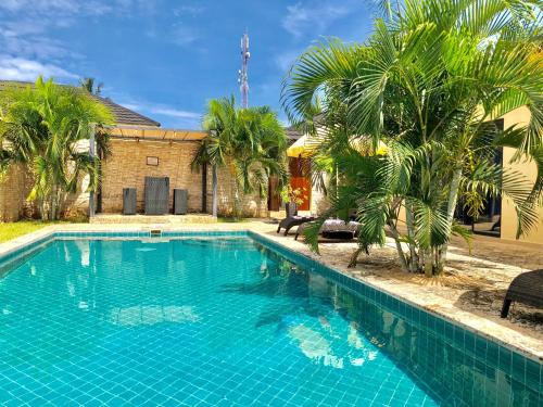 Πισίνα στο ή κοντά στο Amber Villas Diani