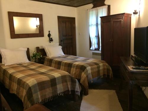 Ένα ή περισσότερα κρεβάτια σε δωμάτιο στο Stefanina Guesthouse