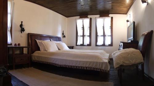 Ένα ή περισσότερα κρεβάτια σε δωμάτιο στο Stefanina Guesthouse