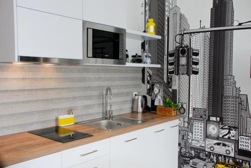 Kuchyňa alebo kuchynka v ubytovaní Prime Apartments