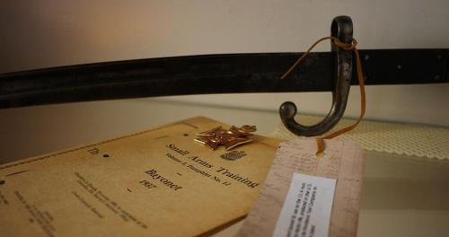 a piece of paper sitting on top of a table at Sir Isaac Brock B&B Luxury Suites in Brockville
