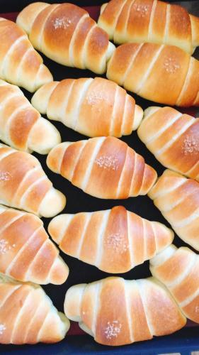 a bunch of uncooked breads are lined up at Summer Homestay in Kenting
