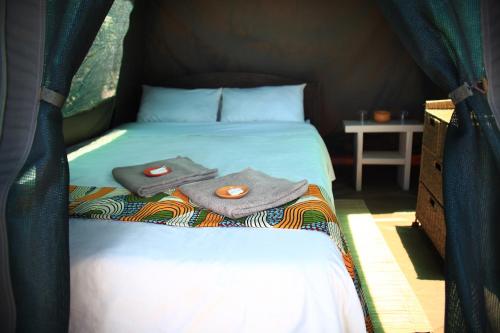 Letto o letti in una camera di Dunes de Dovela eco-lodge