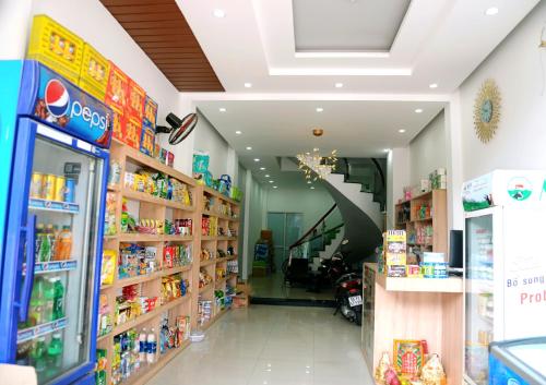 a store aisle with shelves of products in a store at Khoi Nguon in Da Nang