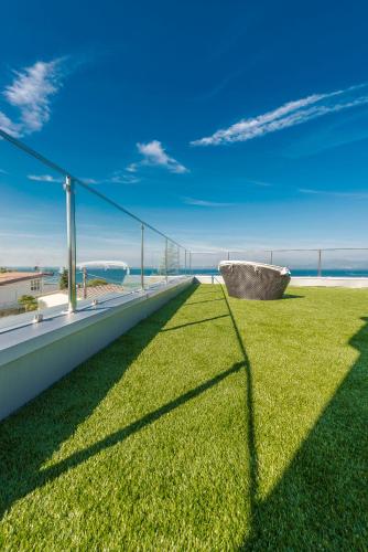 a view from the roof of a building with grass at Hotel Villa Katy in Bardolino