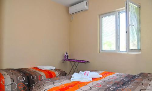 Cama o camas de una habitación en Apartmani Bulajic