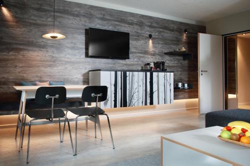 TV a/nebo společenská místnost v ubytování Dorint Resort Winterberg