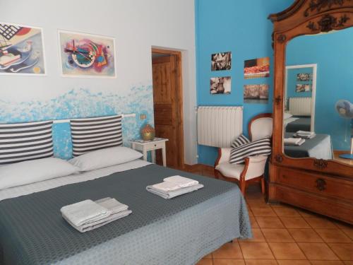 מיטה או מיטות בחדר ב-Agriturismo Salento D'Arare