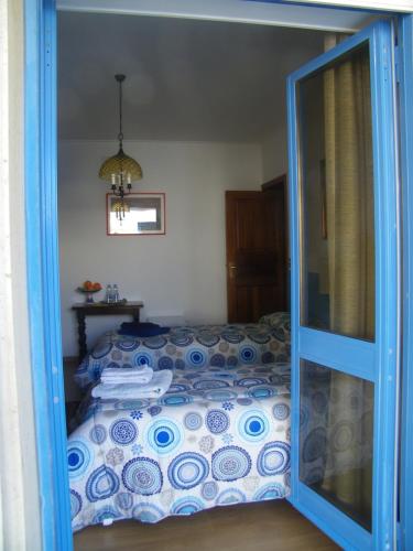 Ένα ή περισσότερα κρεβάτια σε δωμάτιο στο Villa Teodora