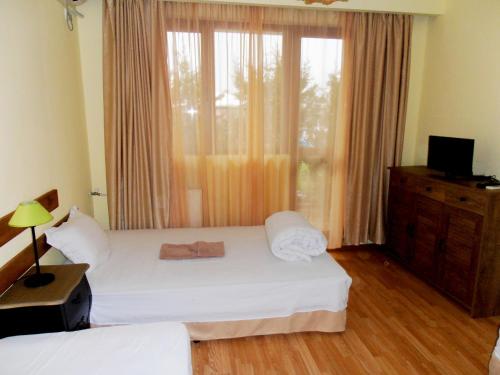 Кровать или кровати в номере Guest House Misha