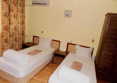 Кровать или кровати в номере Guest House Misha