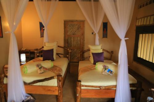 Легло или легла в стая в Hoima Cultural Lodge