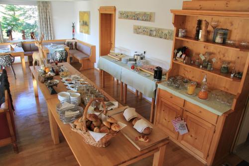 a kitchen with a large island in a room at Haus Sommerberg in Feldberg